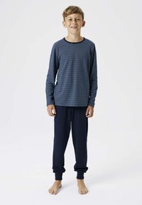 Striped long-sleeve shirt in navy and light blue, paired with navy pants. Both are made from soft fabric with ribbed cuffs and waistband.