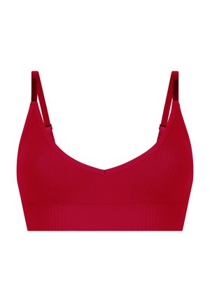 Bralette rouge côtelé avec de fines bretelles réglables et un décolleté en V. Texture douce avec une bande sans couture en bas. Pas d'ornementation visible.