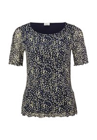 Marinblus med prickigt mönster i kräm och ljusgrönt. Korta, genomskinliga ärmar och en scalloped nederkant. Slät tygstruktur.