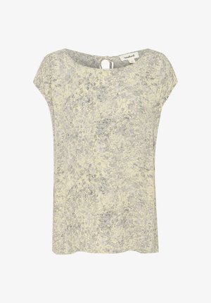 Rövid ujjú top világosszürke és sápadt sárga színben, texturált virágmintával. Kulcslyuk kivágással és laza szabással rendelkezik. Puha anyag.