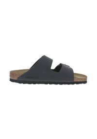 Sandales Birkenstock noires avec deux larges sangles croisées, semelle en liège et semelle en caoutchouc texturé. Logo embouti sur le côté.