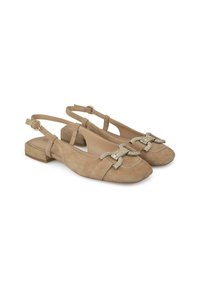 Ballerine in suede beige con cinturino alla caviglia e tacco basso a blocco, decorate con un dettaglio a fiocco metallico impreziosito da strass nella parte anteriore.