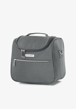 Sac de voyage gris en tissu texturé, avec un sommet arrondi, des fermetures éclair, une poche avant, une poignée et des accents en matériel de marque.