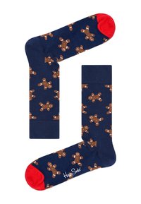 Calzini blu navy con un motivo ripetuto di omini di pan di zenzero, con dettagli rossi sui polsini e sulla punta, realizzati in tessuto morbido. Marchio Happy Socks visibile.