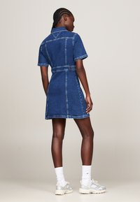 Tommy Jeans FLARED DRESS - Denim dress - blue
