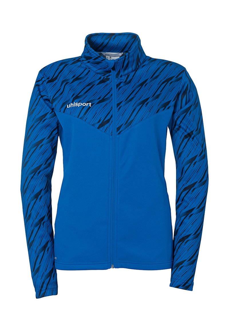 Blå sportsjakke med fuld lynlås, høj krave og abstrakt sort stribedesign på skuldrene. Har 'uhlsport'-logoet på venstre bryst.