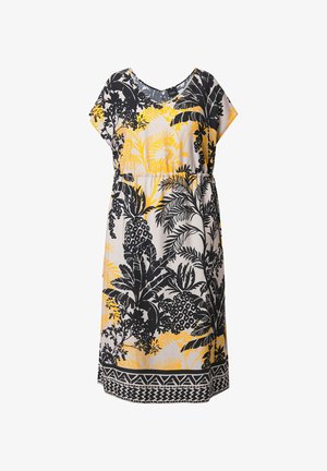 Kurzes Kleid aus leichtem Stoff, mit einem schwarz-gelben Muster aus tropischen Blättern und Ananas, und einem kontrastierenden gemusterten Saum.