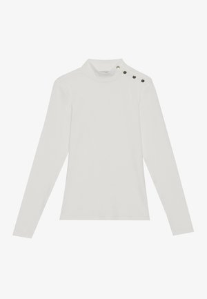 Camisola de manga longa branca com um decote alto, apresentando três botões decorativos pretos no ombro esquerdo, feita de um tecido macio e elástico.
