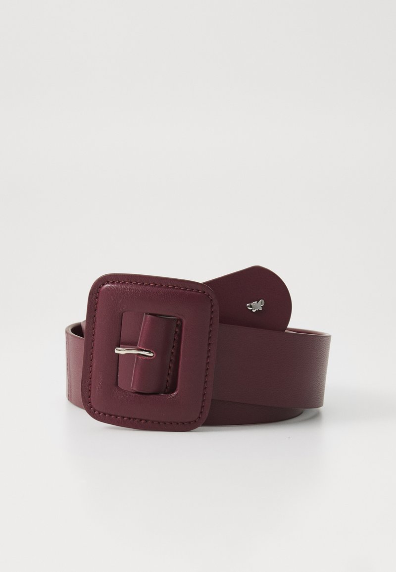 Burgundy leather belt with a square buckle and a metallic prong. Smooth texture with contrasting stitching and a small decorative emblem.