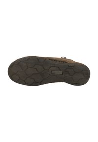 Sole di scarpa marrone con una superficie di gomma testurizzata che presenta un motivo esagonale, offrendo trazione e durata per diversi terreni.