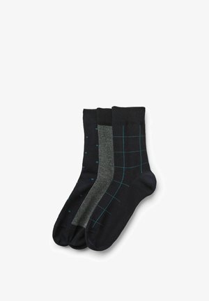 Drei Paare schwarze Socken mit unterschiedlichen Mustern: türkisfarbene Polka-Dots, graues Fischgrätmuster und türkisfarbene Gitterlinien.