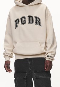 Pegador Sweat à capuche - sand