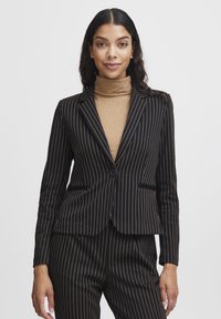 Black blazer with vertical gold stripes, fitted design, notched lapels, single button closure, and side pockets. Made from textured fabric.