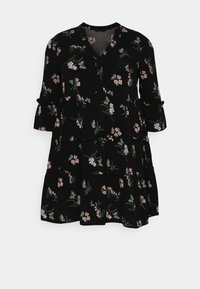 Black dress featuring a floral pattern in pink and green. V-neckline, three-quarter sleeves, and tiered ruffle detail at the hem.