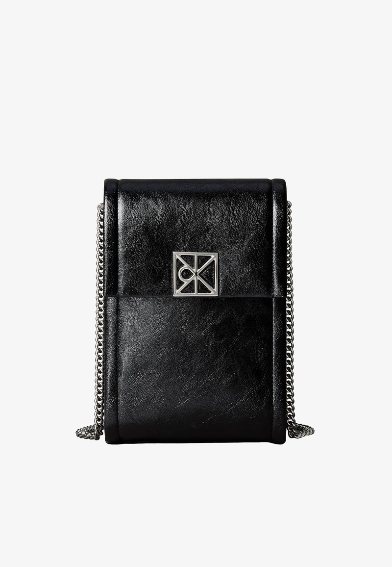 Black leather crossbody bag with silver chain strap and a silver geometric clasp on front flap.