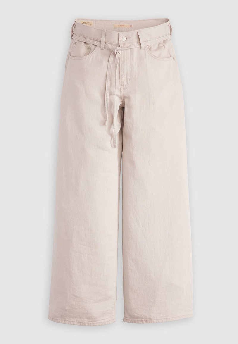 Pantaloni a gamba larga beige chiaro in denim, con chiusura a bottone, passanti per cintura e tasche frontali. Tessuto morbido con una vestibilità rilassata.