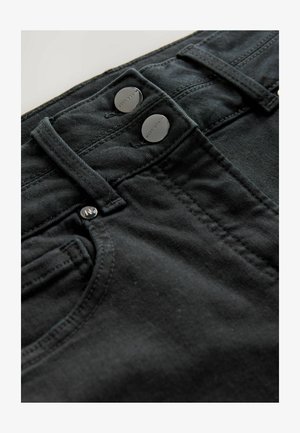 Jeans in denim nero con due bottoni metallici, cuciture in vista e una texture liscia. Presentano un design classico della vita.