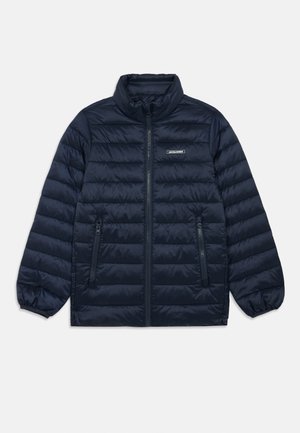 Navy puffer jacket with a high collar, zip-up front, quilted design, and elastic cuffed sleeves. Features two zippered side pockets.