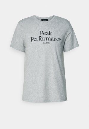 Sivi pamučni majica s kratkim rukavima i okruglim izrezom, s crnim natpisom "Peak Performance Est. 1986" na prednjoj strani.