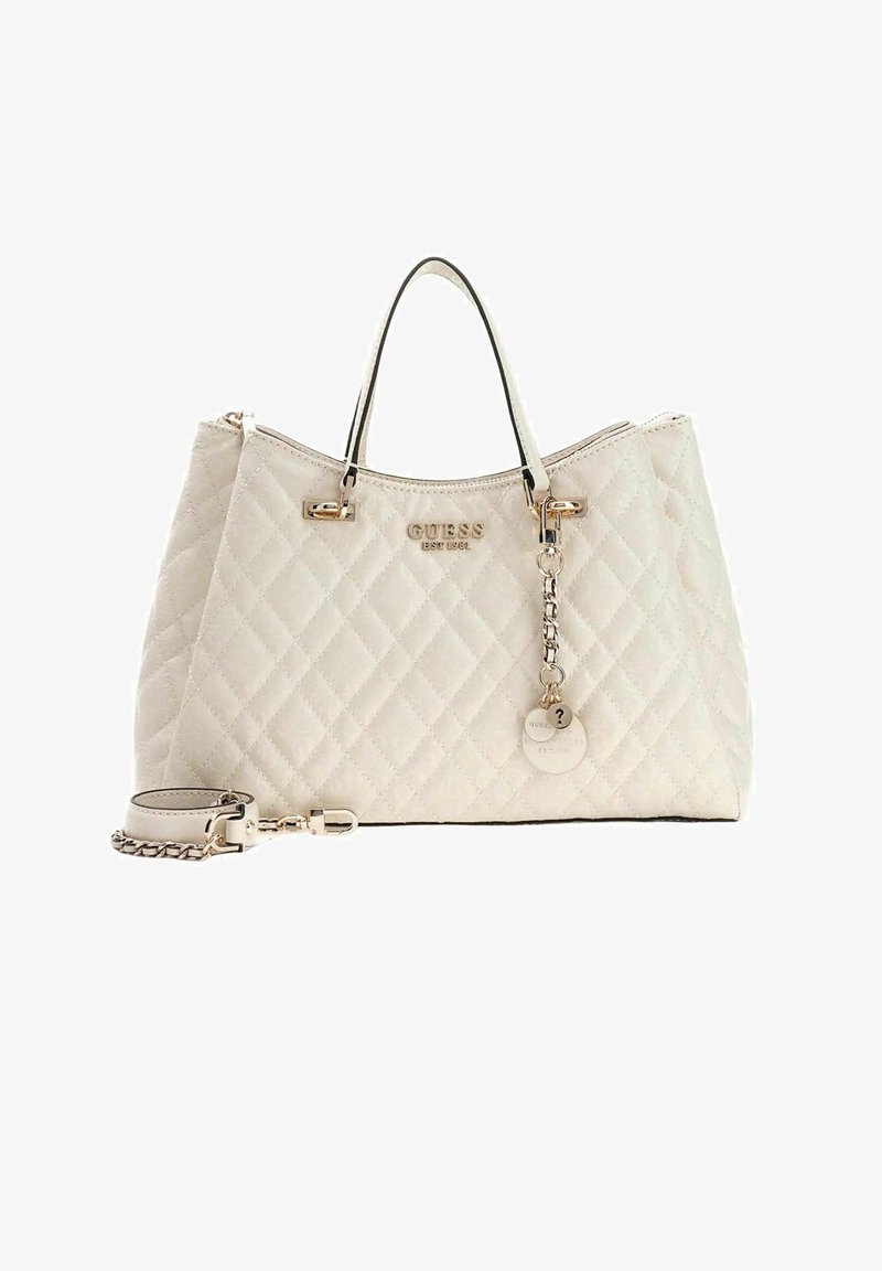 Borsa bianca trapuntata con particolari in oro, doppi manici e tracolla removibile. Presenta un charm con ciondoli rotondi.