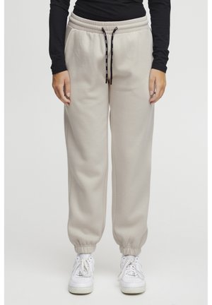 SANDIE - Tracksuit bottoms - oyster