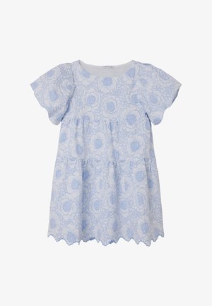 Light blue blouse featuring a floral pattern, short flutter sleeves, a round neckline, and a scalloped hem with tiered design elements.