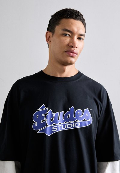 Études DOUBLE SLEEVE - Pikkade varrukatega topp - black