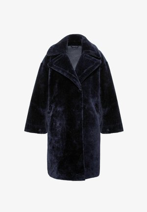 Navy blue faux fur coat with a notched collar, oversized silhouette, and side pockets. Textured surface with a soft, plush finish.
