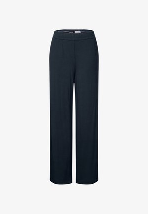 Pantalons larges bleu marine foncé en tissu doux et extensible. Caractérisés par une taille élastique et des poches latérales pour plus de confort.