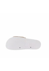 Semelle de chaussure en caoutchouc blanc avec une texture à rainures horizontales, présente une marque imprimée et des indications de taille. Le côté supérieur n'est pas visible.