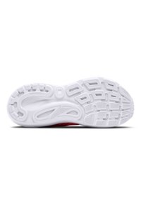 Suola di scarpa da corsa bianca con grip in gomma testurizzata, caratterizzata da un intricato motivo di scanalature e ritagli per una migliore trazione.