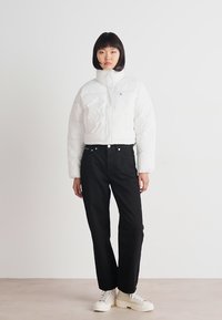 Calvin Klein Jeans HERO 90S STRAIGHT - Straight leg jeans - classic black