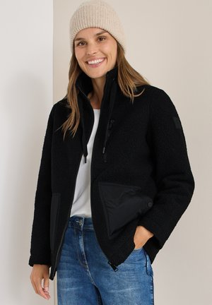 KUSCHELIGE MIT DETAILS - Giacca in pile - schwarz