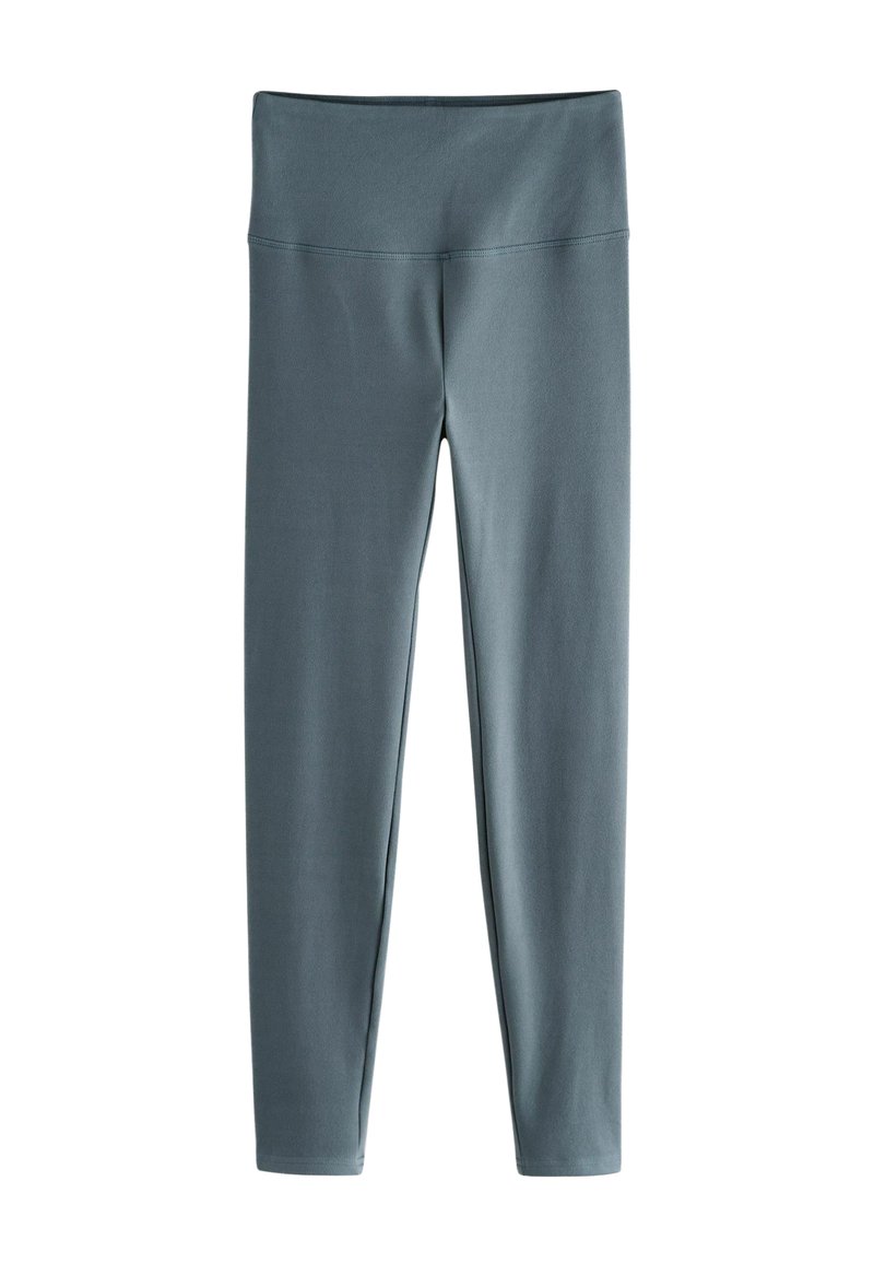 Leggings en tissu doux et extensible de couleur bleu sarcelle atténuée. Caractéristiques d'une taille haute large et d'une silhouette ajustée. Pas de motifs ni d'accents.