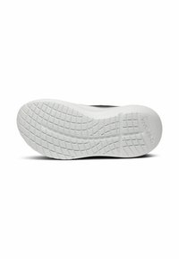 Black sneaker sole with a thick white rubber outsole featuring a textured pattern for grip and stability. "WOOCOM" logo embossed.