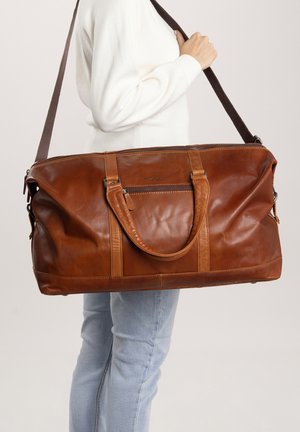 Gusti Leder RUBEN - Sac week-end - honigbraun