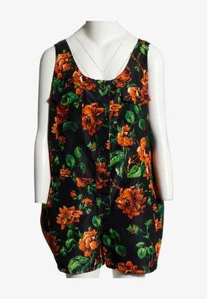 Combinaison noire sans manches avec grand imprimé floral orange, boutons sur le devant et deux poches poitrine sur un mannequin blanc.