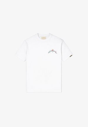 Weißes T-Shirt mit kurzen Ärmeln und Rundhalsausschnitt, mit kleinem, buntem Blumen- und Textdesign "Jardin de Monaco" auf der linken Brust.