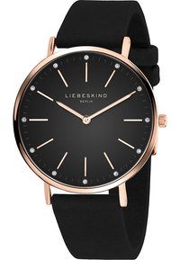 Schwarze Uhr mit rundem Gehäuse, roségoldenen Akzenten und einem glatten Silikonarmband. Das Zifferblatt umfasst Indexmarker und Kristallakzente.