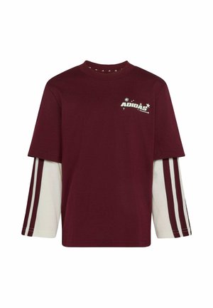 Vinrød kortærmet lag over hvide langærmede med vinrøde striber, med lille hvid Adidas-logo på øverste venstre bryst.