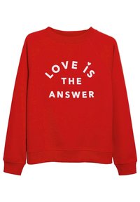 Sweat-shirt rouge avec manches raglan, texte blanc affichant "L'AMOUR EST LA RÉPONSE" en disposition courbée, poignets et ourlet côtelés.