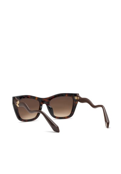 Lunettes de soleil avec verres dégradés marron, montures écaille de tortue et branches marron texturées et courbées avec des accents dorés sur les charnières.