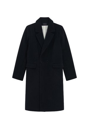 Manteau croisé en bleu marine foncé. Fabriqué en laine, avec un col cranté, des épaules structurées et des poches latérales. Design épuré et minimaliste.