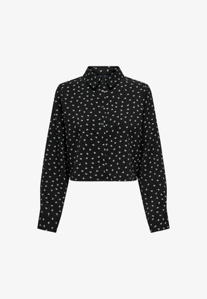 Czarna skrócona koszula zapinana na guziki z drobnym wzorem białych kokardek oraz długimi rękawami z mankietami.