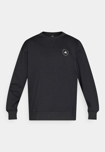 Μαύρο φούτερ με μακριά μανίκια, στρογγυλή λαιμόκοψη και μικρό λευκό κυκλικό λογότυπο στο αριστερό στήθος. Λεία υφή υφάσματος, casual σχεδιασμός.