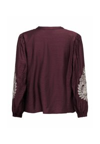 Bordeaux bluse med lange puffærmer, der har hvide broderede blomster mønstre på ærmerne og en afslappet pasform. Tekstureret stof.