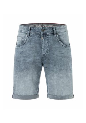 Light blue rolled-hem denim shorts with front button, zipper, belt loops, and front pockets, branded "TIMEZONE" inside the waistband.
