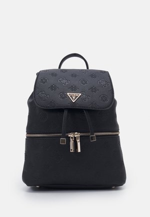 Black textured backpack with embossed logos, front flap secured by drawstrings, a zipper compartment, and a triangular metal Guess logo on the flap.