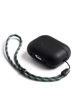 Black wireless earbud charging case with built-in USB-C port and attached green and grey patterned wrist strap loop.