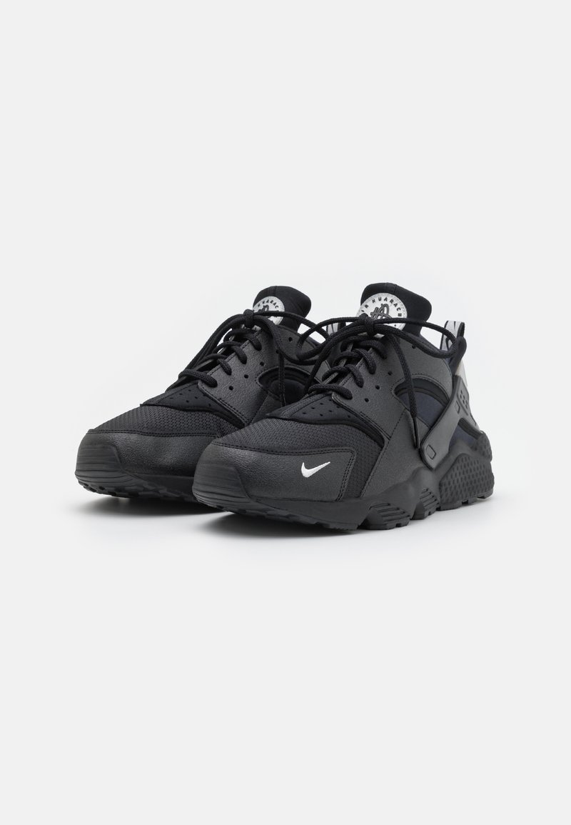 Nike huarache nere e azzurre Outlet